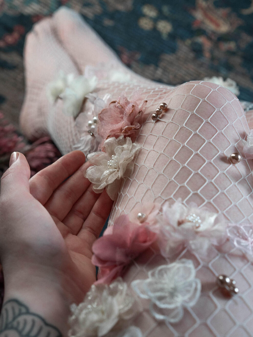 Floral white fishnet stockings handstitched with flowers and pearls